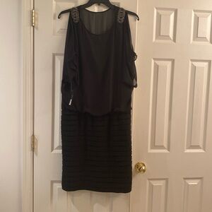 After 5 black dress with open shoulder; sequence on shoulder; elastic waist.